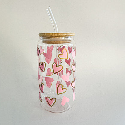 Pink and gold heart-patterned Valentine glass tumbler with bamboo lid and glass straw